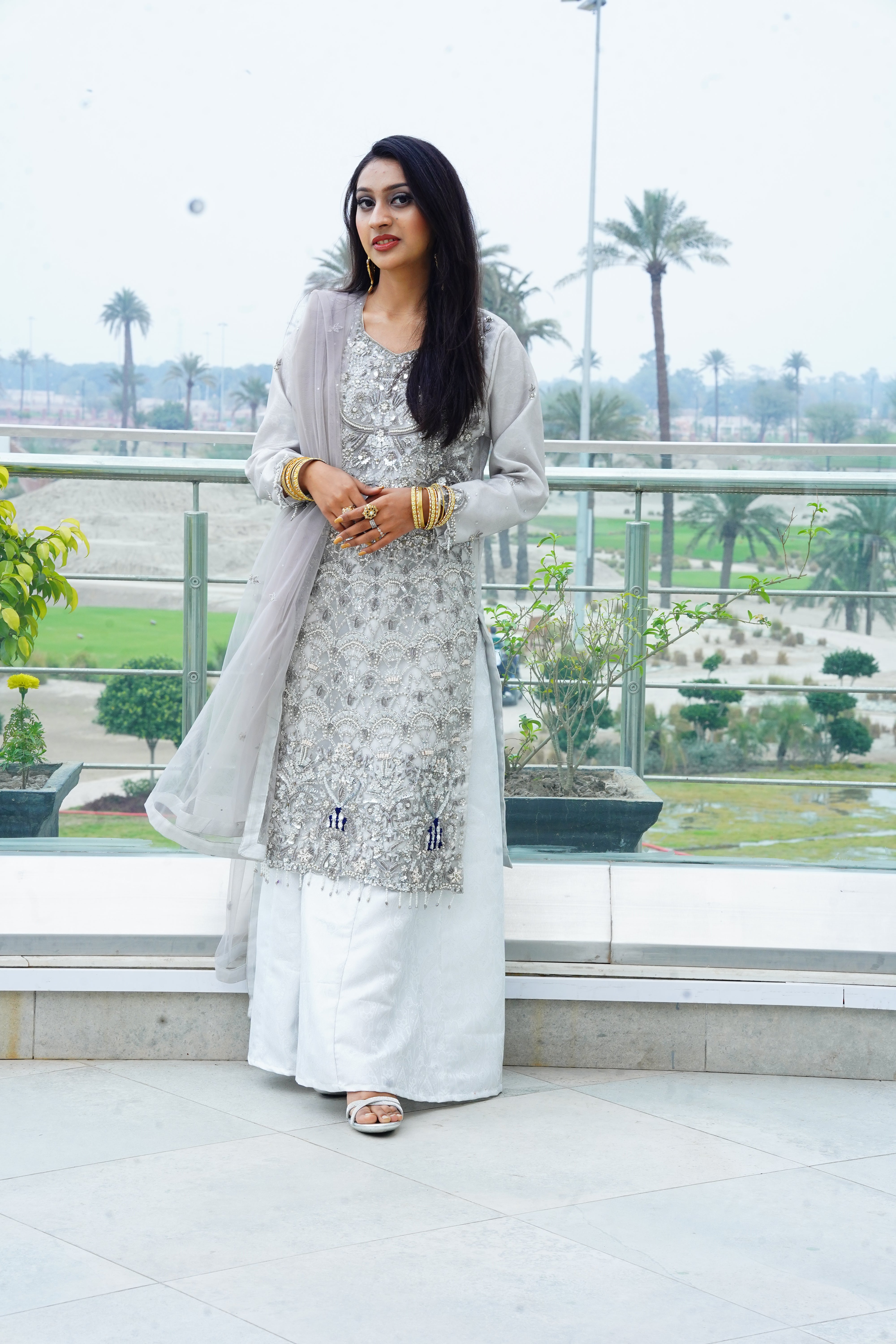 Long Net Shirt Heavily Embroidered with Jamawar Sharara And Net Dupatta