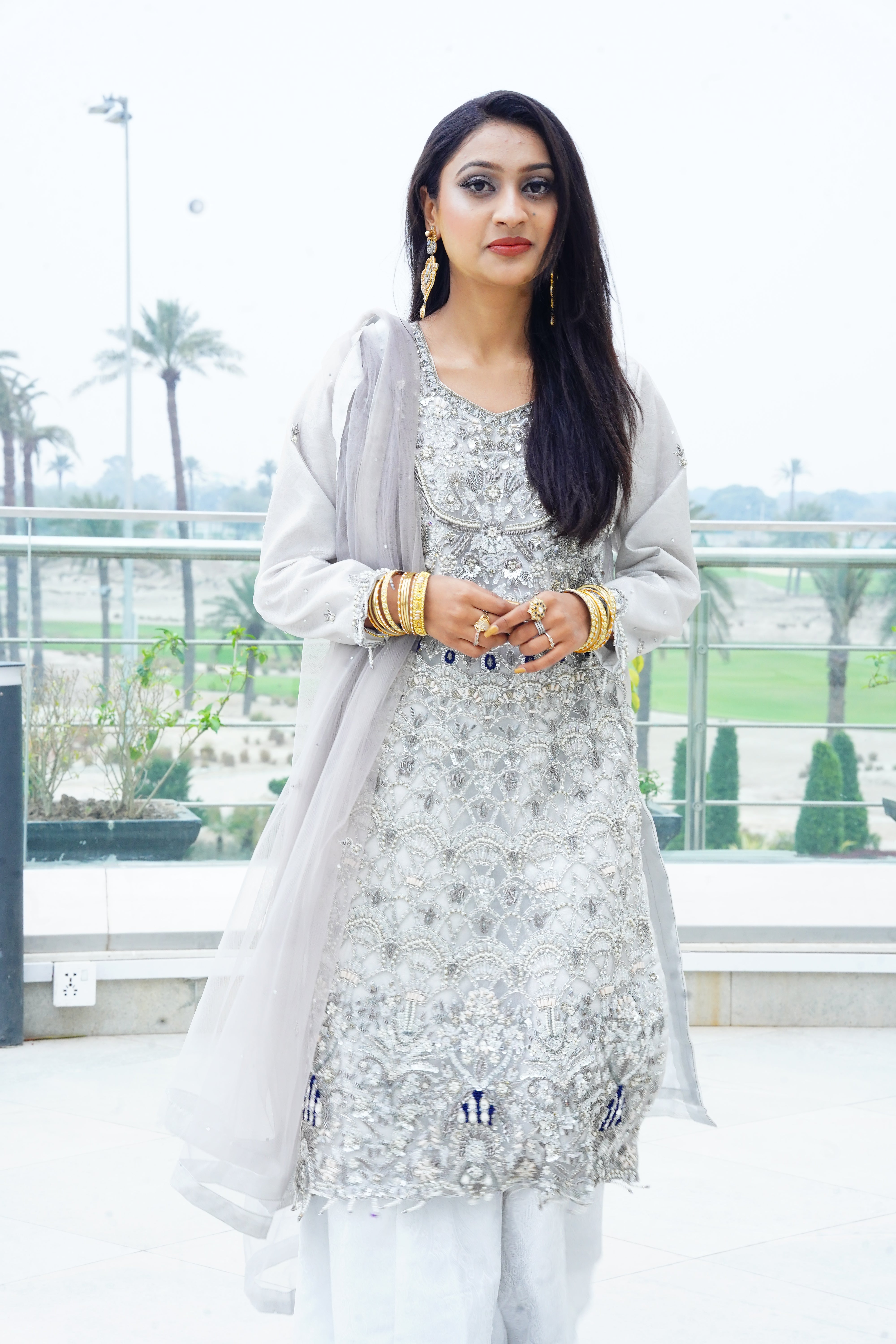 Long Net Shirt Heavily Embroidered with Jamawar Sharara And Net Dupatta
