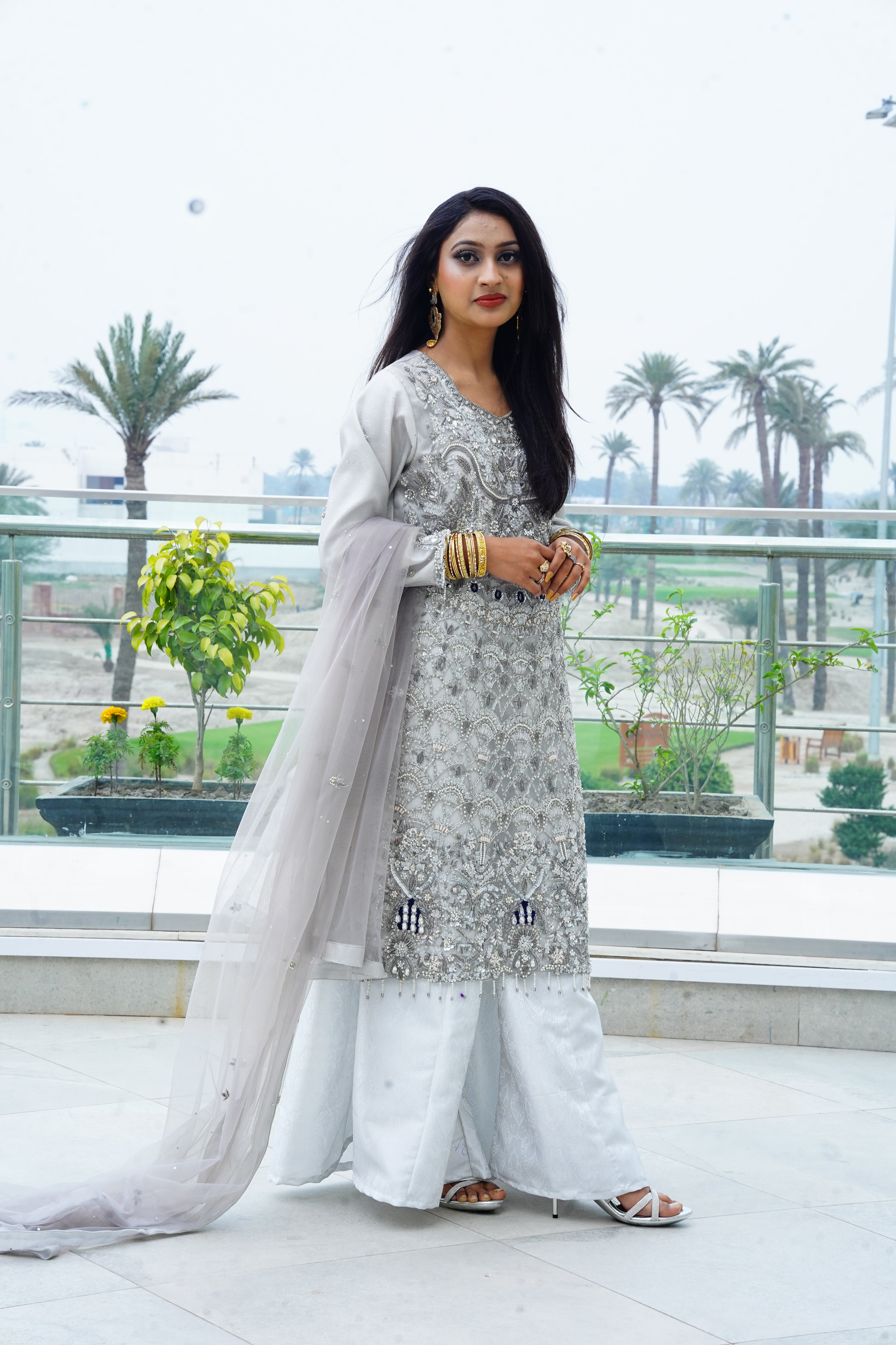 Long Net Shirt Heavily Embroidered with Jamawar Sharara And Net Dupatta